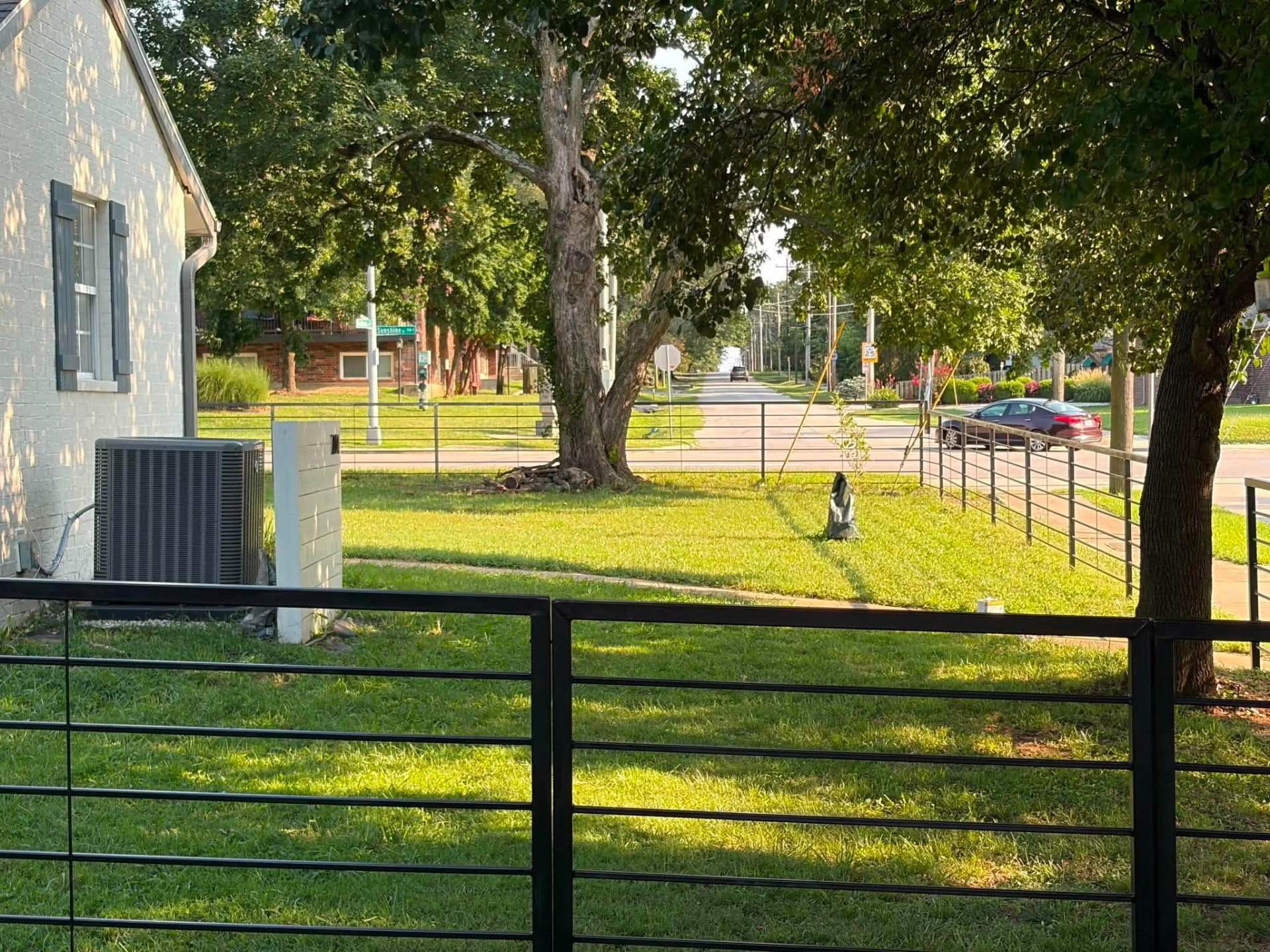 Completed horizontal rail metal fence