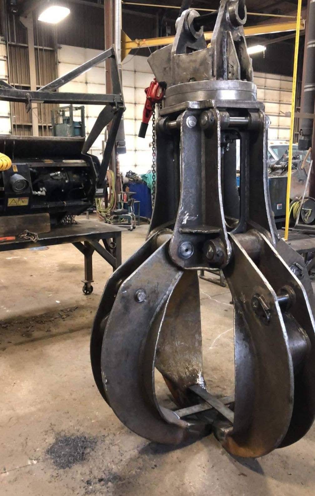 Large rebuilt grapple assembly in the Steele Works shop